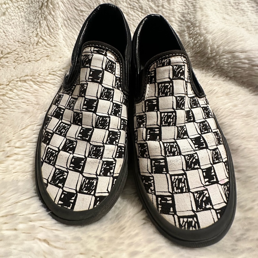 Vans Black and White Checkered Slip-On Sneakers